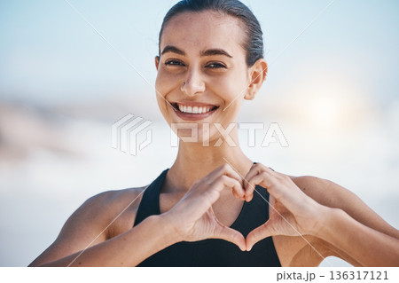 Woman, portrait and heart hands, fitness outdoor with love icon and emoji, happiness and health. Wellness, support and care with female athlete, exercise and symbol, hand gesture and feedback Woman, portrait and heart hands, fitness outdoor with love icon and emoji, happiness and health. Wellness, support and care with female athlete, exercise and symbol, hand gesture and feedback 136317121