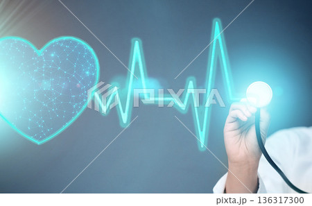 Doctor, hands and 3d heart hologram for cardiology, BPM or monitoring against a studio background. Hand of person, medical or healthcare professional with stethoscope for digital beats or medicare Doctor, hands and 3d heart hologram for cardiology, BPM or monitoring against a studio background. Hand of person, medical or healthcare professional with stethoscope for digital beats or medicare 136317300