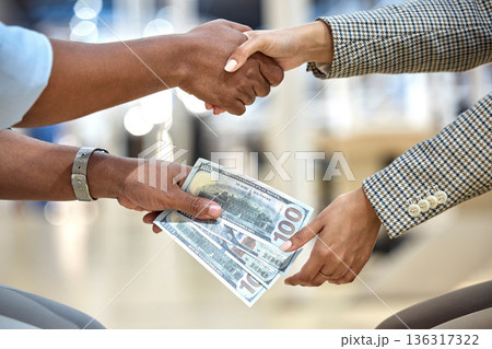 Handshake, money and bribe for office crime, dirty deal and secret partnership for trading in financial industry. Business people, cash and payment for fraud, illegal negotiation and corruption Handshake, money and bribe for office crime, dirty deal and secret partnership for trading in financial industry. Business people, cash and payment for fraud, illegal negotiation and corruption 136317322