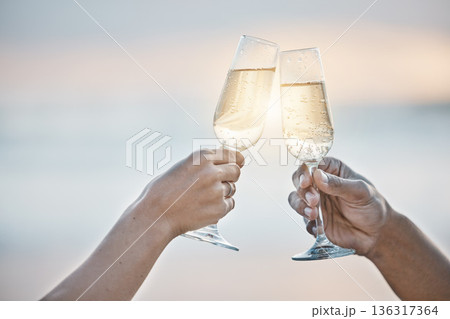Sunset, couple and hands toast with wine glass, having fun or bonding together on mockup space. Vacation, champagne and people cheers with alcohol drink for celebration on holiday, summer or party. Sunset, couple and hands toast with wine glass, having fun or bonding together on mockup space. Vacation, champagne and people cheers with alcohol drink for celebration on holiday, summer or party. 136317364