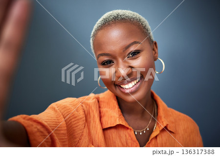 Beauty, selfie and black woman with a smile, profile picture and freedom with against a grey studio background. Portrait, female person or model with happiness, confident or fashion with social media 136317388