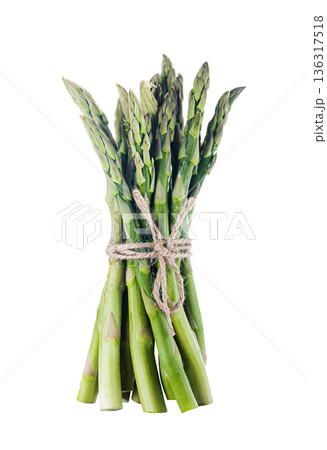 Fresh green asparagus, closeup. Isolated on white background Fresh green asparagus, closeup. Isolated on white background 136317518