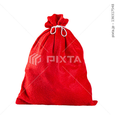 Red christmas present bag with gifts. New Year celebration. Isloated Red christmas present bag with gifts. New Year celebration. Isloated 136317548
