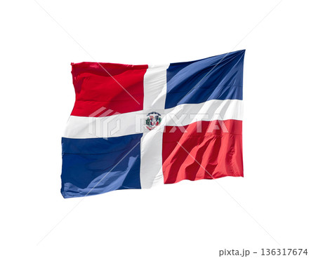 Flying and waving flag of Dominican Republic on wind, closeup. Isolated on white background 136317674