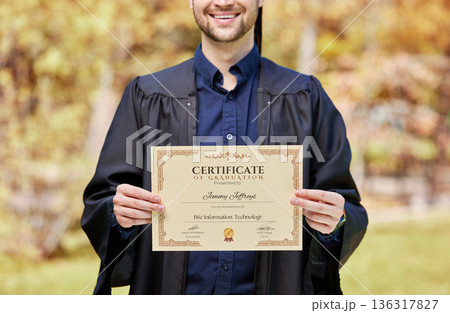 University, man and student with certificate in closeup with award at college for success in future. Graduation, man and diploma as achievement with education for degree in information technology. 136317827