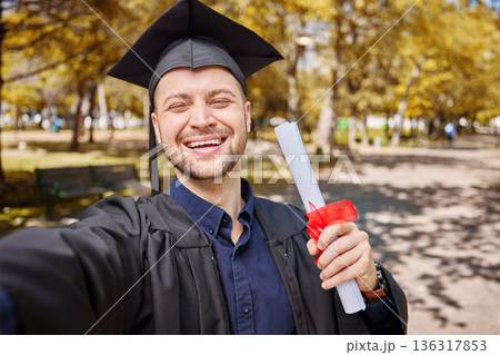 Man, graduation selfie and certificate for college student, smile and excited for future at campus event. Graduate guy, education and celebration with diploma, memory or profile picture for life goal Man, graduation selfie and certificate for college student, smile and excited for future at campus event. Graduate guy, education and celebration with diploma, memory or profile picture for life goal 136317853