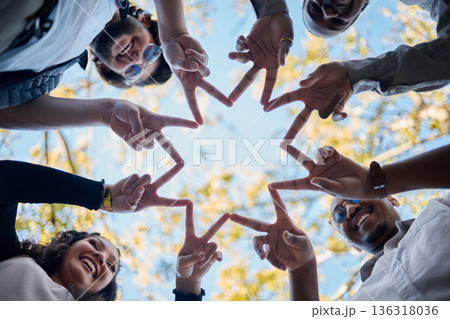 Creative people, hands and star with fingers in teamwork, solidarity or collaboration in nature. Low angle of team group touching hand together for faith, support or community, hope or startup goals Creative people, hands and star with fingers in teamwork, solidarity or collaboration in nature. Low angle of team group touching hand together for faith, support or community, hope or startup goals 136318036