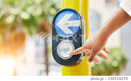Crosswalk, arrow and button with hand of woman in city for traffic light, intersection and safety. Travel, sign and stop with person at pedestrian crossing in street for press, transport and warning Crosswalk, arrow and button with hand of woman in city for traffic light, intersection and safety. Travel, sign and stop with person at pedestrian crossing in street for press, transport and warning 136318270