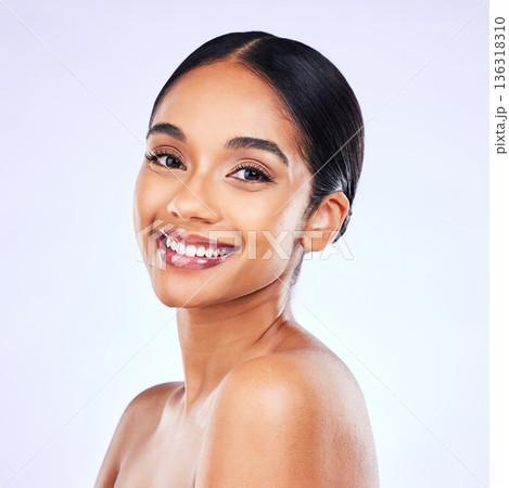 Portrait, beauty and smile with a model woman in studio on a gray background for natural wellness. Face, skincare and aesthetic with a happy young person posing for luxury cosmetics or dermatology Portrait, beauty and smile with a model woman in studio on a gray background for natural wellness. Face, skincare and aesthetic with a happy young person posing for luxury cosmetics or dermatology 136318310