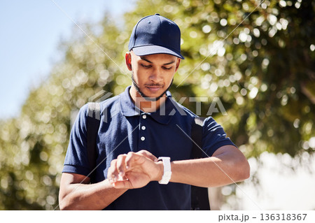 Courier, city and man check watch for package, parcel and customer order delivery in urban town. Ecommerce, logistics and male person with time management for travel, transport and shipping service 136318367