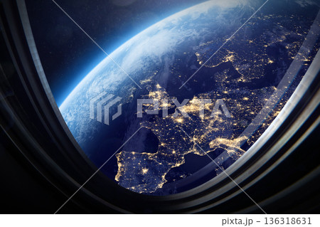 Spaceship porthole view of Earth, space mission. Europe. 136318631