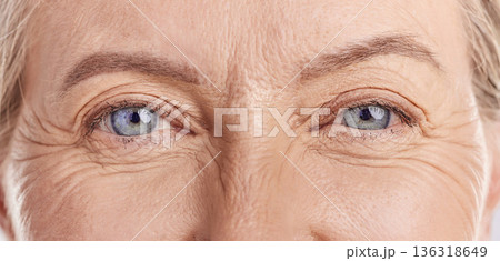Closeup of senior woman, eyes and wrinkles with vision, skin with face and natural beauty. Anti aging, dermatology and female model with eye care, wellness and cosmetics, skincare and contact lens Closeup of senior woman, eyes and wrinkles with vision, skin with face and natural beauty. Anti aging, dermatology and female model with eye care, wellness and cosmetics, skincare and contact lens 136318649