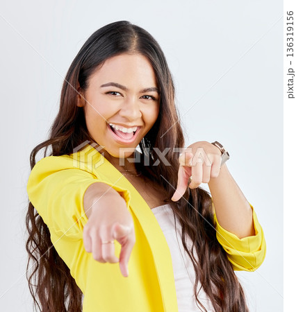 Portrait, pointing and choice with an excited woman in studio on a gray background to select you. Smile, hands and decision with a happy young female model in yellow clothes to vote on an option Portrait, pointing and choice with an excited woman in studio on a gray background to select you. Smile, hands and decision with a happy young female model in yellow clothes to vote on an option 136319156
