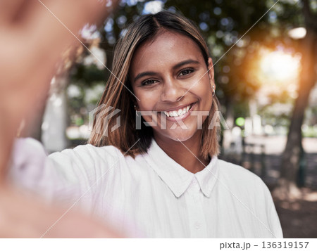 Girl, smile and selfie in outdoor in nature for travel or to relax with peace or style for social media. Happy, face and portrait with woman at park or influencer with freedom, positive or confident. 136319157