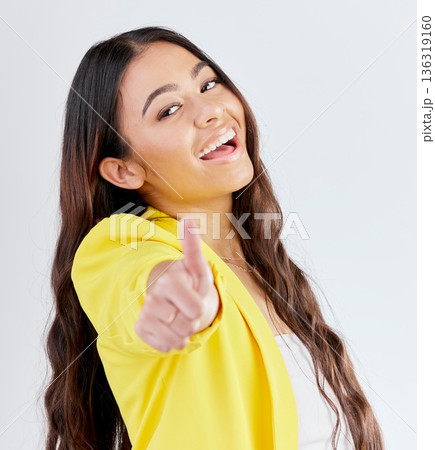 Portrait, support and woman with thumbs up, achievement and like symbol against a white studio background. Winning, female person or model with hand gesture, sign or positive with review or agreement Portrait, support and woman with thumbs up, achievement and like symbol against a white studio background. Winning, female person or model with hand gesture, sign or positive with review or agreement 136319160