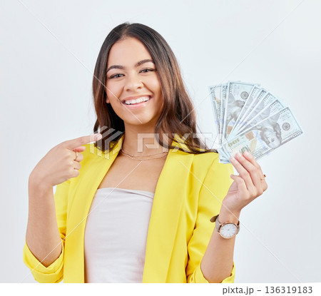 Money, portrait and happy woman point at business cash prize, bonus salary or investment payment. Financial winner, studio gesture and professional person smile for wealth revenue on white background 136319183