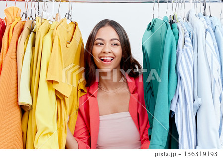 Fashion, choice and clothes with woman in studio for decision, shopping and wardrobe. Boutique, retail and store with face of female customer on white background for search, creative and sale Fashion, choice and clothes with woman in studio for decision, shopping and wardrobe. Boutique, retail and store with face of female customer on white background for search, creative and sale 136319193