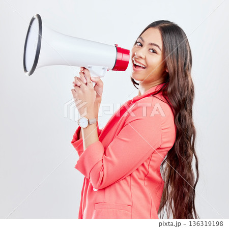 Portrait, megaphone or happy woman with announcement on a white background for speech or review. Smile, attention or voice of girl with news or broadcast of opinion on mockup space talking on speaker 136319198
