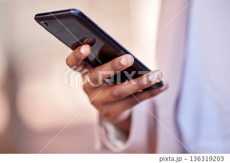Woman, hands and phone for communication, networking or online browsing on social media outdoors. Closeup of female person typing, texting or chatting on mobile smartphone app in city or urban town 136319203
