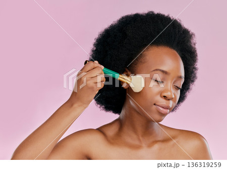 Black woman, brush and makeup with beauty and skin, foundation or powder application on pink background. Cosmetic tools, skincare and African model glow, cosmetology and facial, self care in studio Black woman, brush and makeup with beauty and skin, foundation or powder application on pink background. Cosmetic tools, skincare and African model glow, cosmetology and facial, self care in studio 136319259