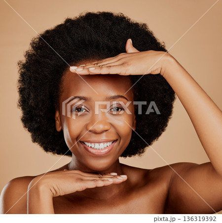 Face, black woman and skincare frame for beauty in studio isolated on a brown background. Portrait, natural cosmetics and happy model with healthy skin, wellness and aesthetic in spa facial treatment Face, black woman and skincare frame for beauty in studio isolated on a brown background. Portrait, natural cosmetics and happy model with healthy skin, wellness and aesthetic in spa facial treatment 136319392
