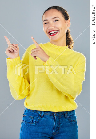 Student, portrait and woman pointing to presentation, news or announcement for college opportunity. Show, information and happy person or model for university or education on studio white background Student, portrait and woman pointing to presentation, news or announcement for college opportunity. Show, information and happy person or model for university or education on studio white background 136319517