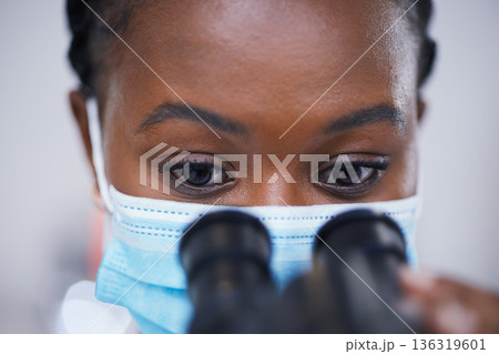 Mask, microscope or black woman scientist in laboratory for research, analysis or experiment innovation. Healthcare, investigation or biologist with lab equipment for future development or results Mask, microscope or black woman scientist in laboratory for research, analysis or experiment innovation. Healthcare, investigation or biologist with lab equipment for future development or results 136319601