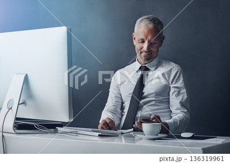 Phone, office and business man online for social media, internet and browse website at desk. Networking, corporate worker and happy mature male person on smartphone for message, email and planning Phone, office and business man online for social media, internet and browse website at desk. Networking, corporate worker and happy mature male person on smartphone for message, email and planning 136319961