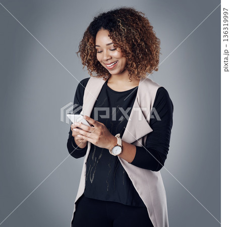 Business, happy and woman with a smartphone, typing and online reading on a grey studio background. Female person, employee and consultant with a cellphone, search internet and website information Business, happy and woman with a smartphone, typing and online reading on a grey studio background. Female person, employee and consultant with a cellphone, search internet and website information 136319997