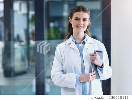 Tablet, happy woman or portrait of doctor with confidence, technology or empowerment in hospital clinic. Face, confident or proud medical worker smiling with positive mindset or optimism in office 136320111
