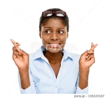 Wish, black woman with her fingers crossed and against a white background for good luck to win competition prize. Giveaway or vote, optimism and African female person with hope hand emoji gesture Wish, black woman with her fingers crossed and against a white background for good luck to win competition prize. Giveaway or vote, optimism and African female person with hope hand emoji gesture 136320167