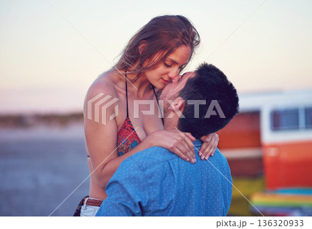Couple, kiss and love at the beach on date, vacation or road trip in summer with partner, together and romantic adventure. People, dating and support in relationship, happiness or boyfriend and girl 136320933
