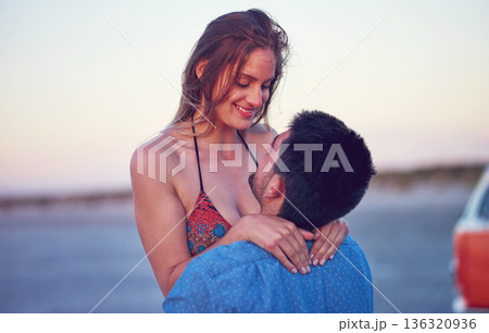 Couple, love and happy at the beach on date, vacation or road trip in summer at sunset, together and romantic adventure. People, hug and support in relationship, happiness or boyfriend and girl Couple, love and happy at the beach on date, vacation or road trip in summer at sunset, together and romantic adventure. People, hug and support in relationship, happiness or boyfriend and girl 136320936