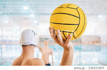 Hand, swimming and a person with a ball for water polo, training and cardio in a pool. Back, start and an athlete ready for a game, match or professional sports in a competition for fitness or health Hand, swimming and a person with a ball for water polo, training and cardio in a pool. Back, start and an athlete ready for a game, match or professional sports in a competition for fitness or health 136321007