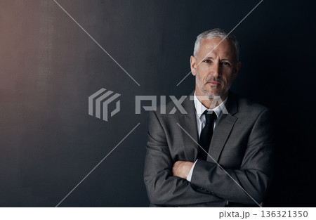 Portrait, serious and businessman with mockup, confident lawyer or attorney on dark studio background. Boss, ceo and professional business owner, proud senior director at law firm with arms crossed. 136321350