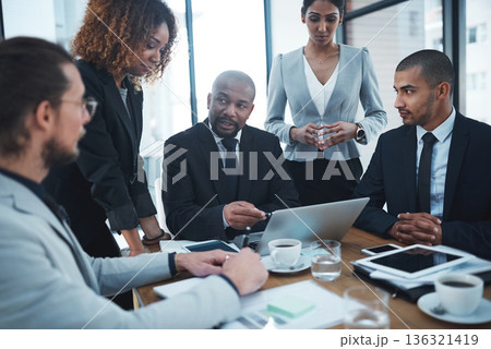 Meeting, planning and business people with laptop in office for brainstorming idea, strategy and collaboration. Corporate, teamwork and men and women working on report, group project and proposal Meeting, planning and business people with laptop in office for brainstorming idea, strategy and collaboration. Corporate, teamwork and men and women working on report, group project and proposal 136321419