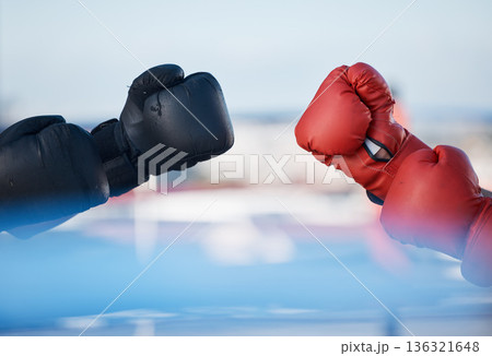 Hands, boxing gloves or sports training, exercise or fist punching with strong power in workout. Background, fitness athletes or combat warriors ready for boxing or fighting in a mma practice match Hands, boxing gloves or sports training, exercise or fist punching with strong power in workout. Background, fitness athletes or combat warriors ready for boxing or fighting in a mma practice match 136321648