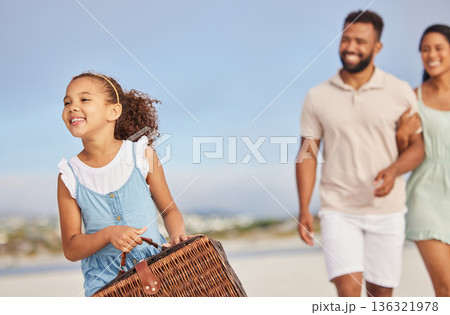 Happy family, parents or kid walking for beach picnic to relax on fun summer holiday vacation together. Excited dad and mother or excited young girl bonding, smiling or holding basket at seashore 136321978