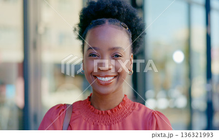 Happy, consultant and face of woman outdoor in city for travel, commute or relax on work break in Nigeria. African, smile and portrait of employee with happiness at office building job in morning 136321993