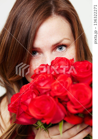 Roses, flowers and portrait of woman with red gift for love, celebrate and a valentines day floral present or glamour. Aesthetic, skincare and eyes of female person or model with plants or a bouquet 136322271
