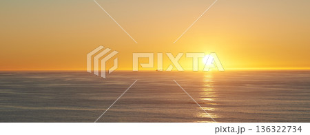 Orange sky, sunset and sea at morning on the horizon with ocean and waves landscape. Sunrise background, calm weather and summer by beach with coastline and outdoor environment with sun and mockup Orange sky, sunset and sea at morning on the horizon with ocean and waves landscape. Sunrise background, calm weather and summer by beach with coastline and outdoor environment with sun and mockup 136322734