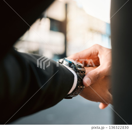 Hands, clock and time with business man in street, road with calendar date, schedule and notification. Entrepreneur, iot watch and check for reminder, closeup and reading in city, cbd or metro street 136322830
