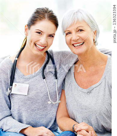 Senior care, happiness and portrait of nurse with old woman in nursing home, help and support from healthcare. Retirement, caregiver service and elderly patient with healthy smile on face in lounge. Senior care, happiness and portrait of nurse with old woman in nursing home, help and support from healthcare. Retirement, caregiver service and elderly patient with healthy smile on face in lounge. 136323394