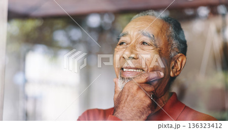 Senior man, happy and thinking at window with retirement planning, reflection and remember memory. Space, elderly person and thoughtful in home with wondering, perspective and insight on decision 136323412