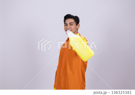 Janitor carrying cleaning equipment on his shoulder Janitor carrying cleaning equipment on his shoulder 136325381