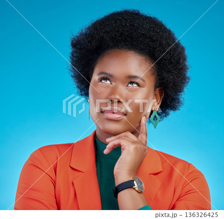 Opportunity, thinking and black woman with problem solving, brainstorming and decision against a blue studio background. Female person, why and model with inspiration, planning and creative ideas Opportunity, thinking and black woman with problem solving, brainstorming and decision against a blue studio background. Female person, why and model with inspiration, planning and creative ideas 136326425
