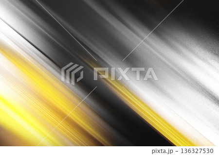 Abstract speed motion background featuring dynamic diagonal streaks of yellow light and brushed silver metal textures 136327530