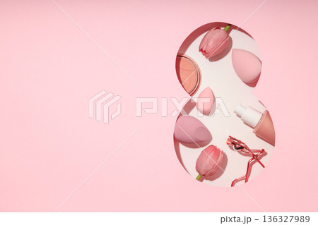 Beauty products and pink tulips arranged for a festive occasion Beauty products and pink tulips arranged for a festive occasion 136327989