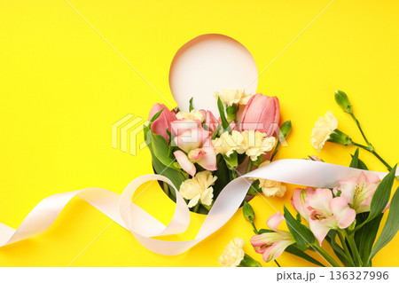 Flowers and ribbon create a joyful scene for celebrating women Flowers and ribbon create a joyful scene for celebrating women 136327996