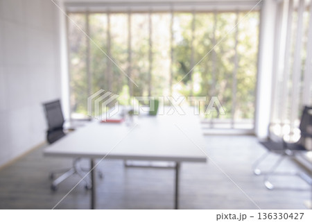 Business office Blurred background meeting room light bokeh education event in company. Blurry abstract background of conference room. Blur background office modern lobby urban decor empty room Business office Blurred background meeting room light bokeh education event in company. Blurry abstract background of conference room. Blur background office modern lobby urban decor empty room 136330427